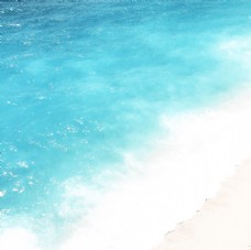蓝色背景海浪沙滩图片