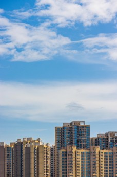 会议背景高楼大厦蓝天白云图片