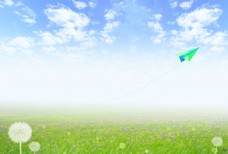 草地素材环保蓝天白云纸飞机图片